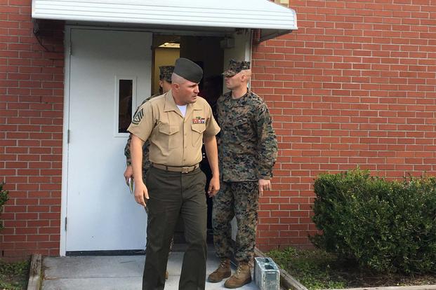 Gunnery Sgt. Joseph Felix exits a military courthouse at Camp Lejeune, N.C., after being sentenced to 10 years in prison for hazing Muslim recruits. (Photo by Hope Hodge Seck/Military.com)