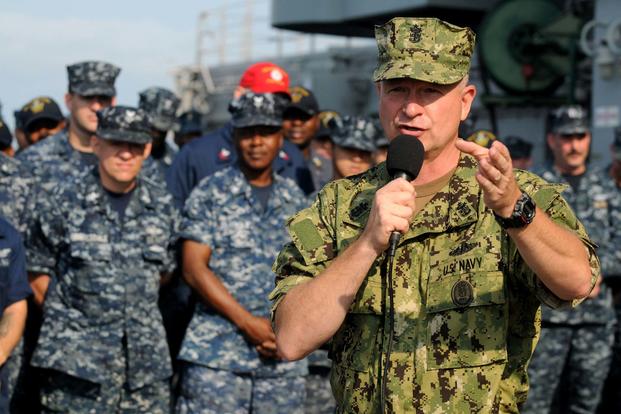 Master Chief Petty Officer of the Navy Rick West holds an all-hands aboard the USS Kearsarge during a visit to Naval Station Norfolk. West is wearing the Navy Working Uniform Type III. (Petty Officer 1st Class Jennifer Villalovos/U.S. Navy)