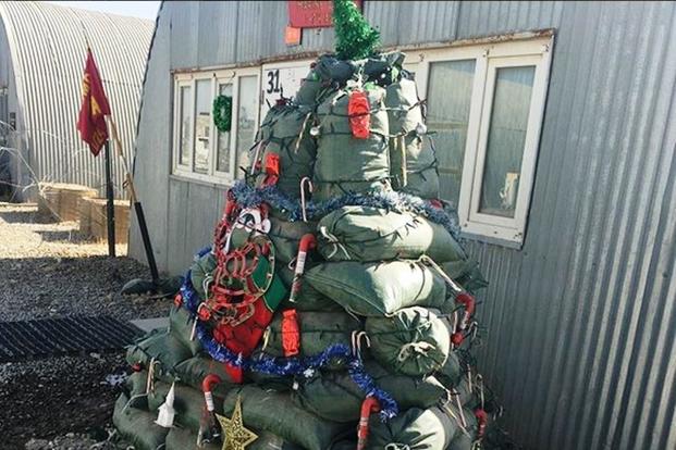 Marines are getting in the Christmas spirit in Helmand Province, Afghanistan. Check out this amazing sandbag Christmas tree! (Photo by Hope Hodge Seck/Military.com)