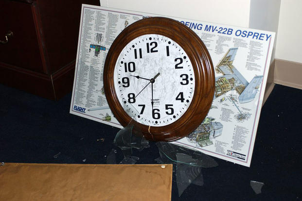 A clock, frozen at the time of impact, inside the Pentagon. (Air Force photo by Staff Sgt. Larry A. Simmons)