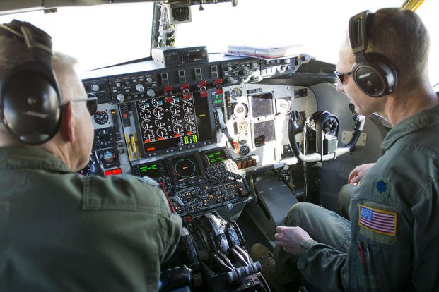 Lt. Col. Eric Wilks (left) and Lt. Col. Marvin Ashbaker, pilots with the 465th Air Refueling Squadron at Tinker Air Force Base, Oklahoma, conduct pre-flight checks aboard the Air Force Reserve Command's first KC-135 Stratotanker to receive the Block 45 upgrade in 2016. (U.S. Air Force photo/Lauren Gleason)