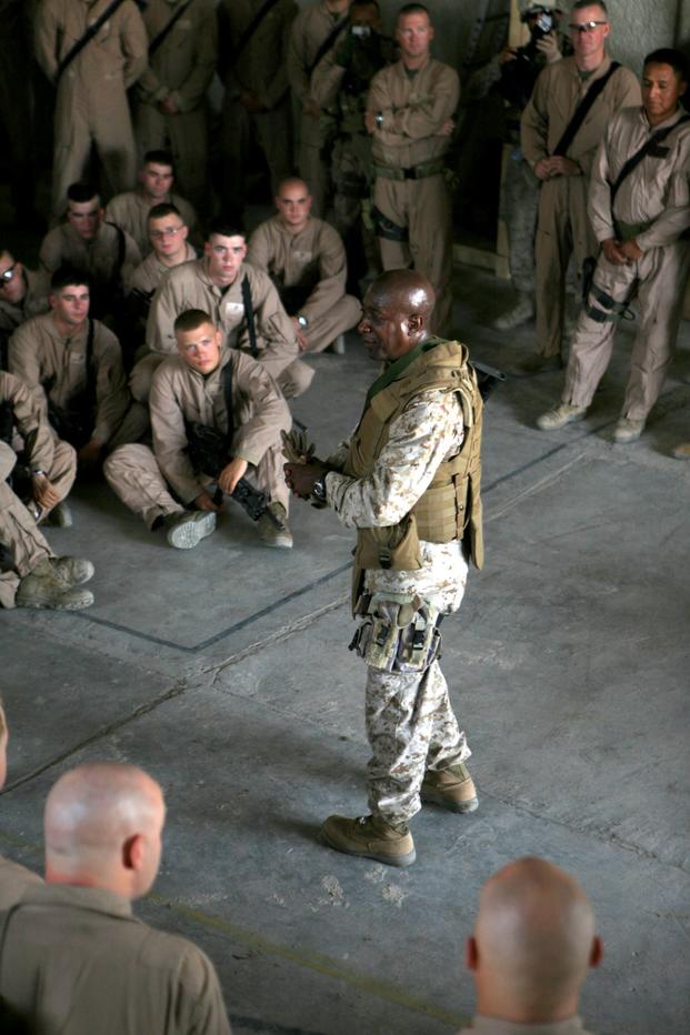 Sgt. Maj. Carlton W. Kent, sergeant major of the Marine Corps, visits Marines from Echo Company, 2nd Battalion, 6th Marines, at Observation Post Sina'a in Al Fallujah, Iraq, on Sept. 23, 2007. Kent traveled throughout the Al Anbar province of Iraq meeting with Marines and service members currently deployed with II Marine Expeditionary Force. II MEF is deployed with Multi National Forces-West in support of Operation Iraqi Freedom in the Al Anbar province of Iraq to develop Iraqi security forces, facilitate t