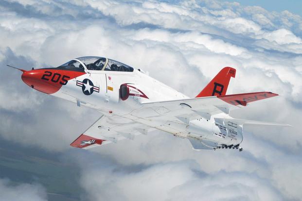 T-45A Goshawk executes a turning rejoin during a formation flight over South Texas. (U.S. Navy/John A. Ivancic)