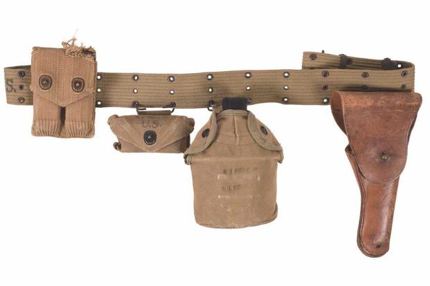 Rock Island Auction Company will auction this pistol belt rig and 1911 Colt .45 automatic pistol.