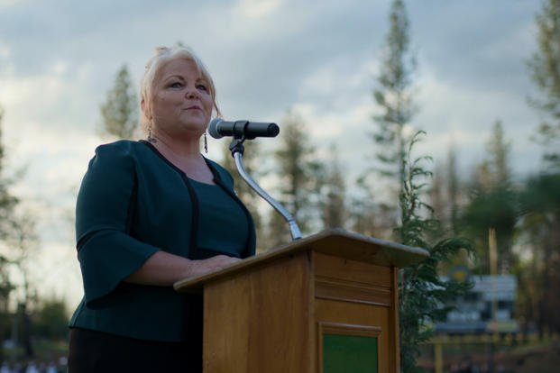 Michelle John addresses Paradise High School students during graduation after the Camp Fire. (National Geographic)