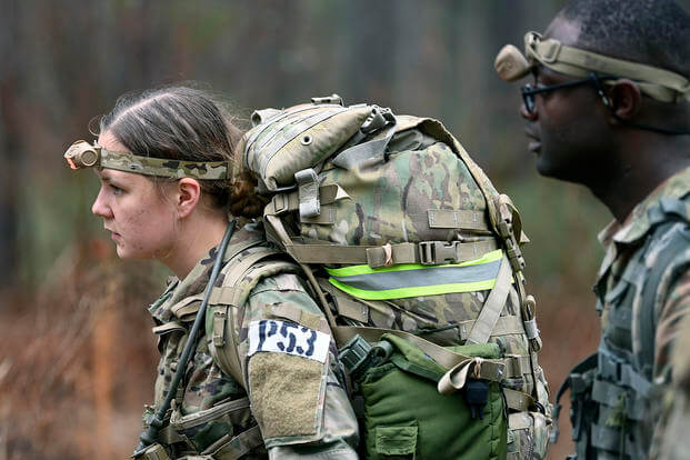 Psychological Operations candidates participate in a team-building event during assessment and selection.