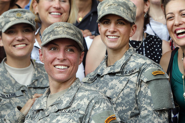 Shaye Haver and Kristen Griest pose with other female West Point alumni.