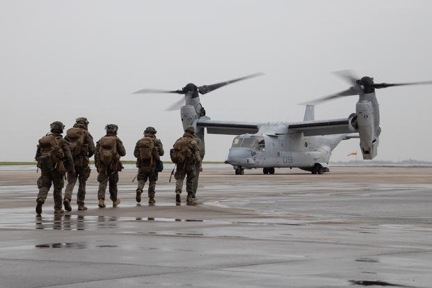 Marines board an Osprey on Okinawa, Japan