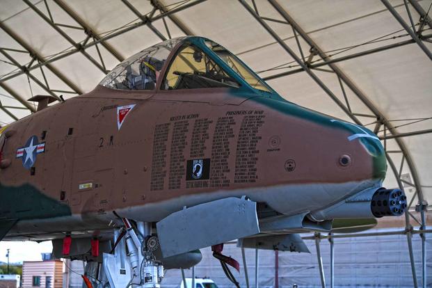 A-10 Thunderbolt with a Vietnam-era SouthEast Asia camouflage paint scheme. 