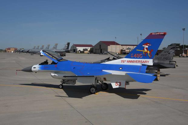 A blue and white F-16 from the 114th Fighter Wing, painted at the Air National Guard Paint Facility in Sioux City, Iowa was painted for the South Dakota Air Guard in commemoration of their 75th anniversary. The paint scheme was conceptualized to emulate the WWII-era Grumman F-4F Wildcat flown by South Dakota native and Medal of Honor recipient Joe Foss. (U.S. Air National Guard photo: Senior Master Sgt. Vincent De Groot) A blue and white F-16 from the 114th Fighter Wing.