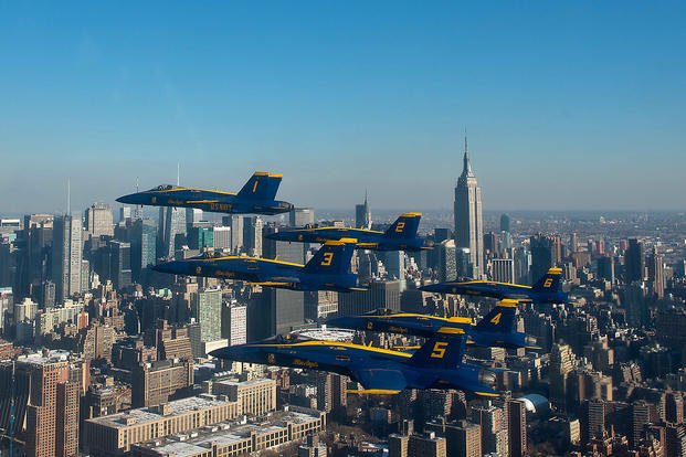 The U.S. Navy Flight Demonstration Squadron, the Blue Angels, pilots fly in the world-renowned Delta Formation past the New York skyline. 