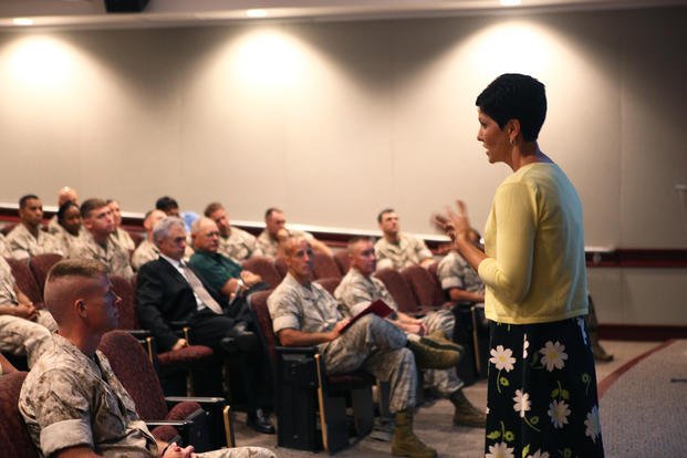 Tanya M. Queiro, deputy equal employment opportunity officer, Civilian Human Resources Officer East, instructs officers and staff noncommissioned officers on the importance of equal opportunity aboard Camp Johnson, N.C.