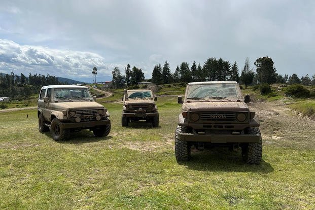 The Marines with the Marine Security Guard Detachment at U.S. Embassy Quito, Ecuador, park their muddy cars after spending the day off-roading at the Rancho Espin.