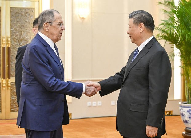 Russian Foreign Minister Sergey Lavrov and Chinese President Xi Jinping 