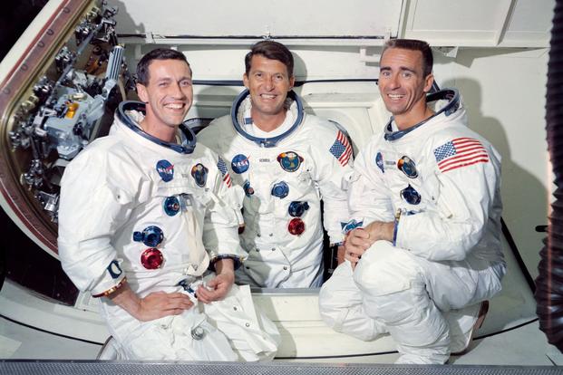 The crew of the first crewed Apollo space mission, Apollo, left to right, are astronauts Donn F. Eisele, command module pilot; Walter M. Schirra Jr., commander; and Walter Cunningham, lunar module pilot.