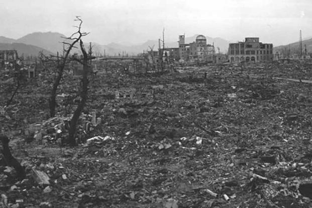 The devastated downtown of Hiroshima with the dome of the Hiroshima Prefectural Industrial Promotion Hall visible in the distance. (National Archives)
