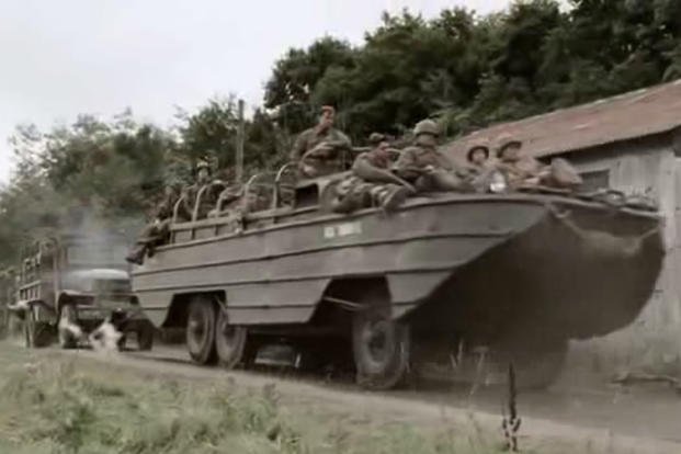 We can’t see the windscreen, but open wheel wells suggest this is an early DUKW. (HBO) We can’t see the windscreen, but open wheel wells suggest this is an early DUKW.