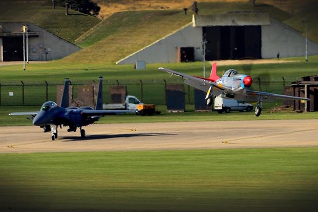 A World War II era P-51 Mustang makes its landing approach at Royal Air Force Lakenheath, England Oct. 4. The aircraft arrived as a reunion between it and its former pilot, Tuskegee Airman U.S. Air Force Lt. Col. (ret) George E. Hardy. (U.S. Air Force photo/ Tech. Sgt. Matthew Plew).
