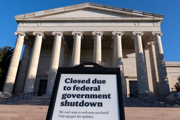 FILE - A sign that reads "Closed due to federal government shutdown," is seen outside of the National Gallery of Art on the 6th day of the government shutdown, in Washington, Oct. 6, 2025. (AP Photo/Jose Luis Magana, File) Government Shutdown Timeline