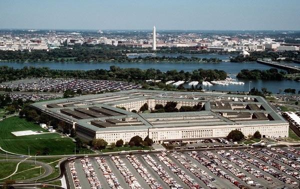 The Pentagon, headquarters of the U.S. Department of Defense, in Arlington, Virginia, on May 1, 2007, with the Washington Monument visible across the Potomac River.  (DoD photo)