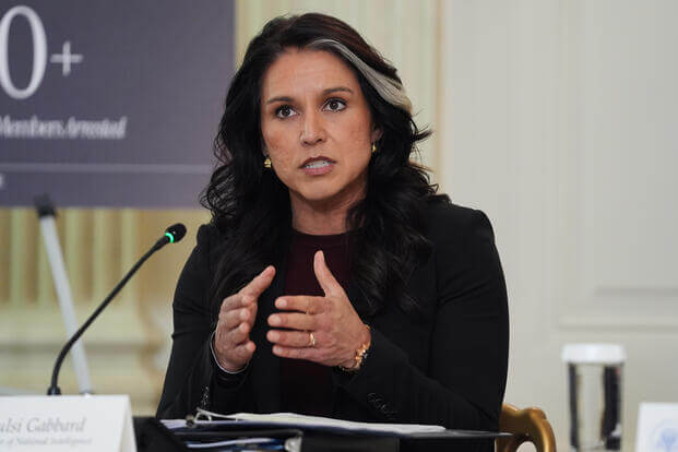 Director of National Intelligence Tulsi Gabbard speaks during a roundtable on criminal cartels with President Donald Trump in the State Dining Room of the White House, Thursday, Oct. 23, 2025, in Washington. (AP Photo/Evan Vucci) Director of National Intelligence Tulsi Gabbard