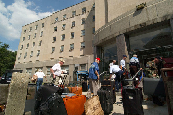 Retirees return to the Armed Forces Retirement Home in Gulfport, Mississippi, after Hurrican Katrina. (Air Force photo)