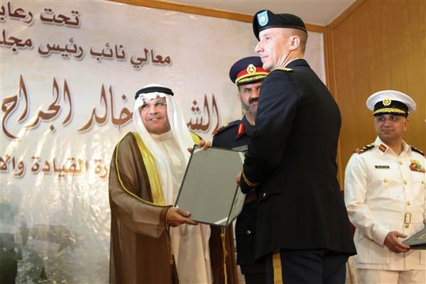 Maj. Robert Bonham receiving award.
