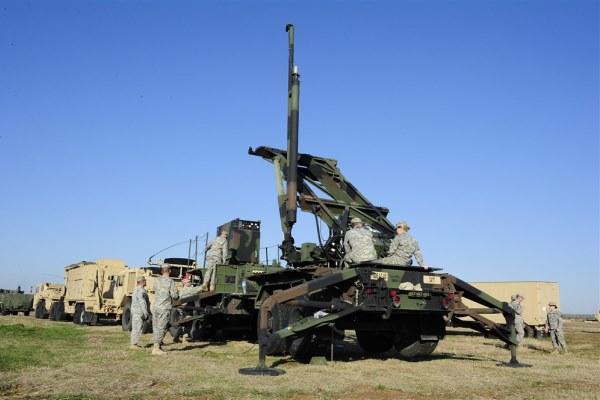 U.S. Soldiers assigned to the 3rd Battalion, 2nd Air Defense Artillery Regiment, 31st Air Defense Artillery Brigade perform operational checks on a NATO Patriot missile launcher at Incirlik Air Base, Turkey, Jan. 14, 2013. (Air Force Photo/Charles Larkin)