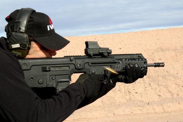 Israeli Weapons Industries US Inc., displayed new features on the 5.56mm Tavor rifle during SHOT Show's range day outside Las Vegas, Jan. 18, 2016. (Photo by Matthew Cox/Military.com)