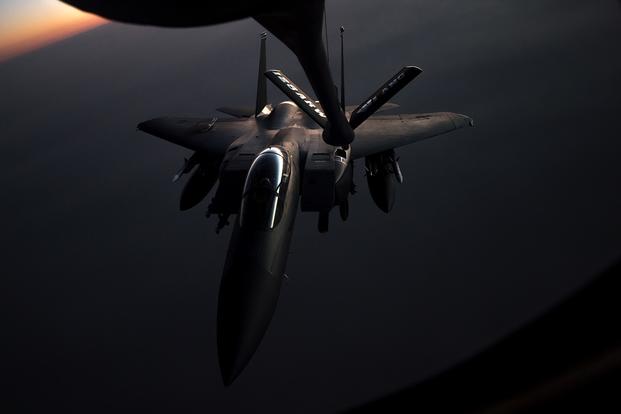 A U.S. Air Force F-15E Strike Eagle is refueled by a KC-135 Stratotanker on May 23, during flight operations in support of Operation Inherent Resolve. (U.S. Air Force photo/Trevor McBride)