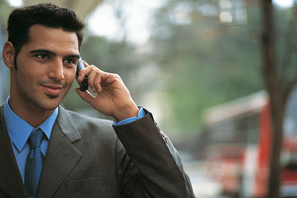 Businessman using a cellphone.