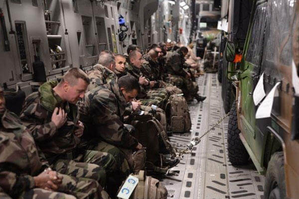 French troops prepare for take-off inside a U.S. Air Force C-17 Globemaster in Istres, France. The U.S. aided the French in moving a mechanized infantry battalion into Mali to fight al-Qaida.
