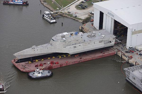 The littoral combat ship Pre-Commissioning Unit (PCU) Coronado (LCS 4) is rolled-out at the Austal USA assembly bay.