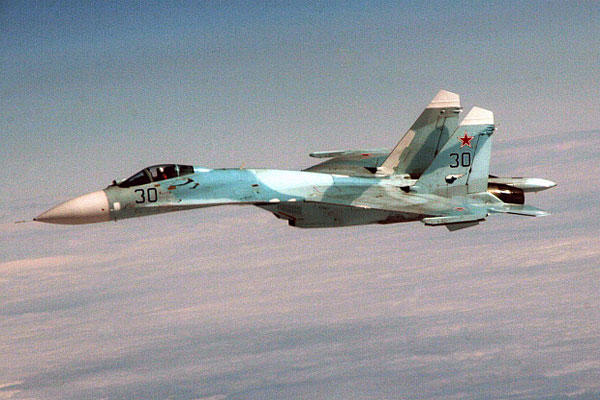 Russian SU-27 fighter performs an exercise maneuver on Aug. 8, 2010, over Anchorage, Alaska. Michael Humphreys/U.S. Army 