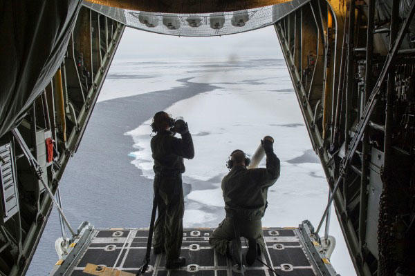 A Coast Guard C-130 launches an ocean-current probe as part of a Navy study on Arctic Ocean. (Navy photo)