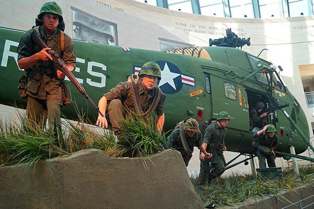 This new tableau depicts Marines heading for cover as they exit a Vietnam-era Sikorsky UH-34D helicopter during Operation Starlite in 1965. (National Museum of the Marine Corps photo)