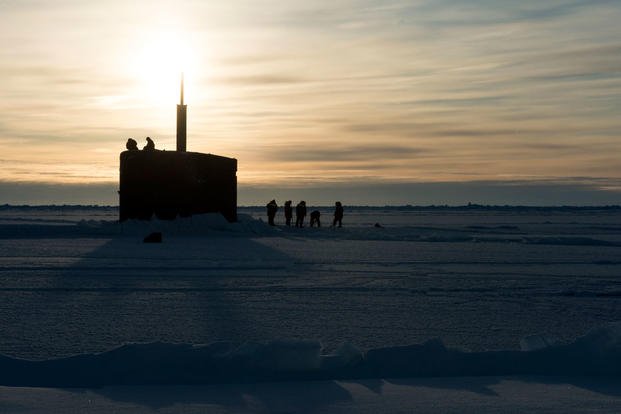 SS Hampton (SSN 767) surfaces through the ice in the Arctic Circle during Ice Exercise (ICEX). (Photo: Mass Communication Specialist 2nd Class Tyler Thompson)
