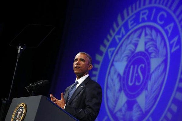 President Barack Obama speaks about veterans issues at the American Legion’s 96th National Convention at the Charlotte Convention Center in Charlotte, N.C., Tuesday, Aug. 26, 2014.. (AP Photo/Charles Dharapak)