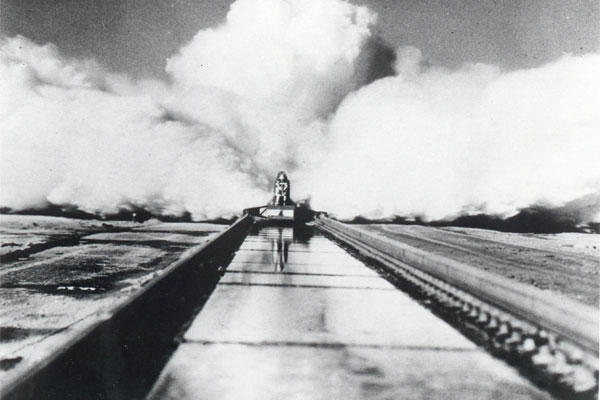 On December 10, 1954, Col. John P. Stapp propelled down the Holloman High Speed Test Track aboard the Sonic Wind Rocket Sled 1 at a rate of 632 miles per hour, earning the title "The Fastest Man on Earth." (Courtesy Photo)