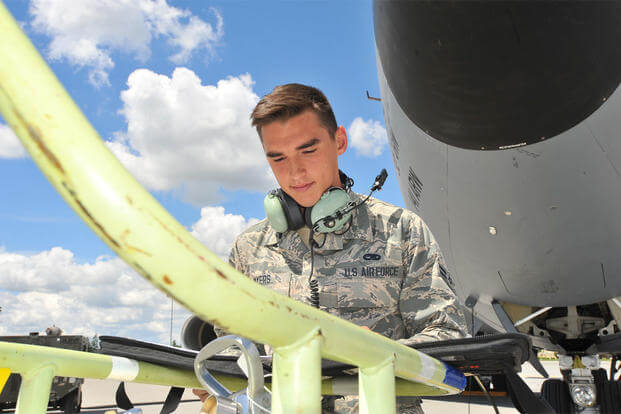 Airman 1st Class Jonah Myers, 92nd Aircraft Maintenance Squadron crew chief, reads a maintenance checklist, May 27, 2015, at Fairchild Air Force Base, Wash. (U.S. Air Force photo/Staff Sgt. Veronica Montes)