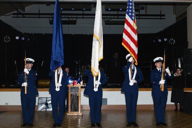 Coast Guard crewmembers from Base Ketchikan, Alaska, present colors at a ceremony hosted by the Greater Ketchikan Chamber of Commerce, Jan. 30, 2016. (Photo: Petty Officer 3rd Class Meredith Manning)