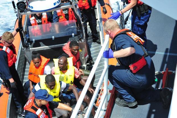 The U.S. Coast Guard Cutter Bernard Webber crew embarks people rescued from a sinking vessel southwest of Freeport, Bahamas on April 9, 2016. (Photo: U.S. Coast Guard)