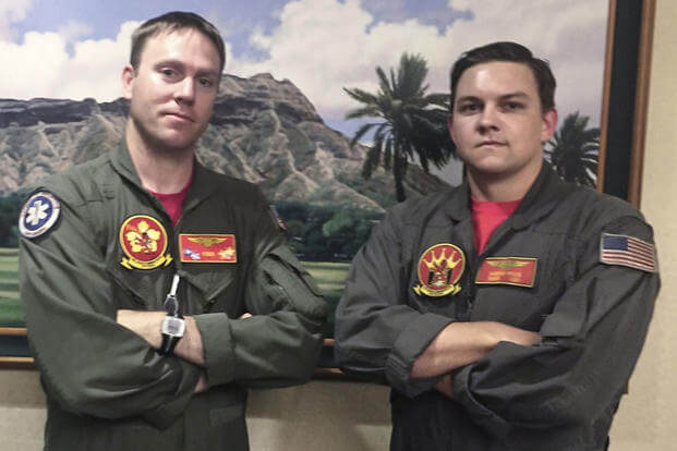 Chief Aviation Aircrewman Jason Lessley and Aviation Aircrewman 2nd Class Hunter Price from Helicopter Sea Combat Squadron (HSC) 15 provided emergency care to a tourist in medical distress on the Diamond Head Trail in Honolulu. (Photo: U.S. Navy)