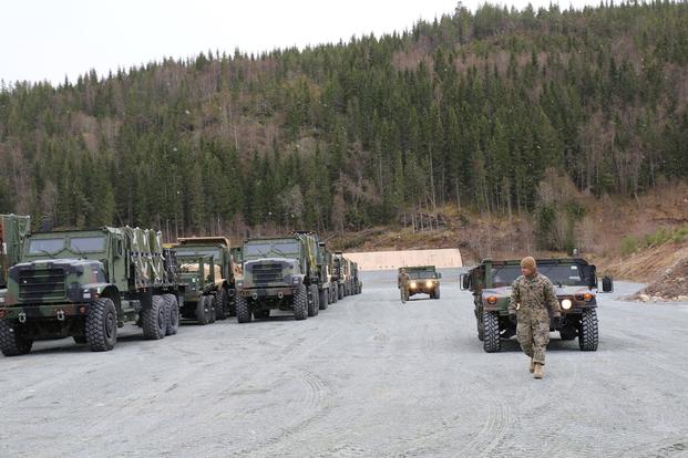 U.S. Marines directed combat vehicles at the Vaernes Garrison in Norway. (Photo by Hope Hodge Seck/Military.com)