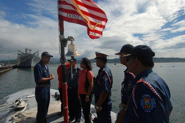 Command Master Chief Jim Lyle offers a tour of the USS Pasadena on a stop through the Philippines at Subic Bay. (U.S. Navy photo)
