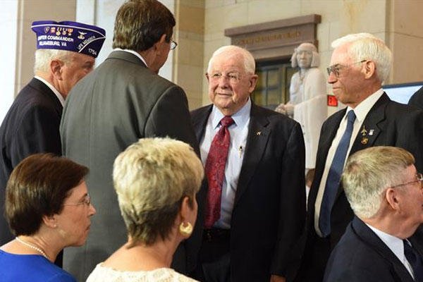 Retired Cols. William Driggers Jr. and Michael Brazelton  speak with other Vietnam War vets during the Congressional Commemoration of the Vietnam War at U.S. Capitol in Washington, July 8, 2015. (U.S. Air Force photo/Staff Sgt. Carlin Leslie)