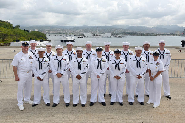 U.S. Pacific Fleet Sea Sailor of the Year (SOY) finalists and Pacific Fleet senior enlisted leaders pose for a group photo in front of the USS Arizona Memorial. (U.S. Navy/MC1 Phillip Pavlovich)