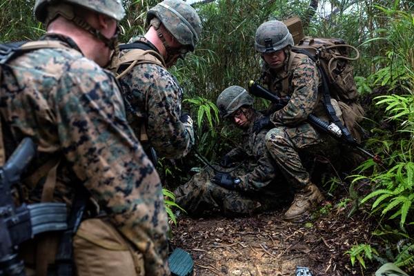 U.S. Marines practice casualty evacuations on May 19, 2016, at the Jungle Warfare Training Center, Camp Gonsalvas, Okinawa, Japan. (Photo by Jessica N. Etheridge/U.S. Marine Corps)