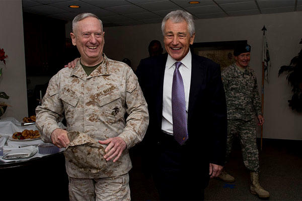 Secretary of Defense Chuck Hagel, right, laughs with General James Mattis at McDill Air Force Base in Tampa, Fla., on March 22, 2013. (DoD photo/Erin A. Kirk-Cuomo)