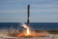 A SpaceX &quot;flight proven&quot; first stage booster successfully lands on Landing Zone 1, Cape Canaveral Air Force Station, Fla., Dec. 15, 2017. (Courtesy photo by SpaceX)